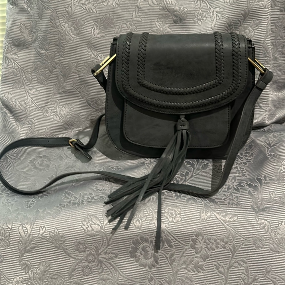 Cross body fringe purse